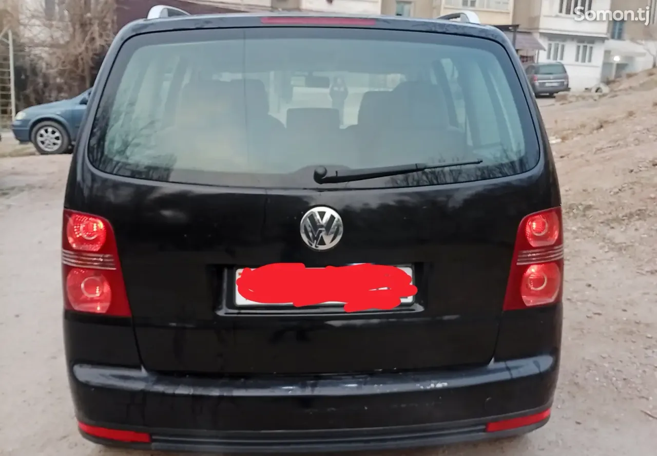 Volkswagen Touran 2007 · 1.4 AT