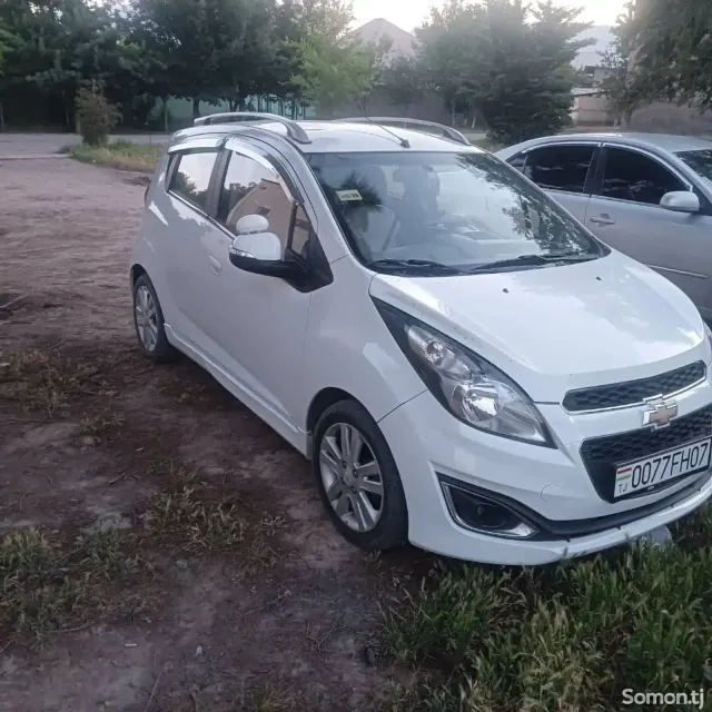 Chevrolet Spark 2014 · 1.1 AT
