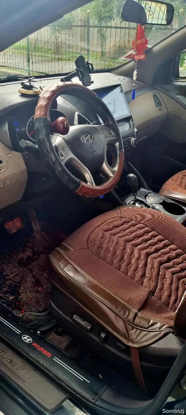 Hyundai Tucson 2011 · 2.0 AT
