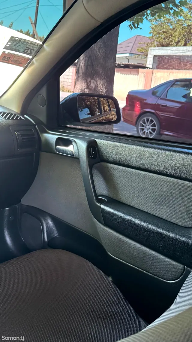 Opel Astra G 2002 · 1.6 MT