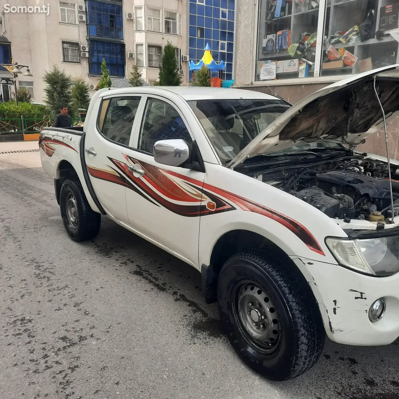 Mitsubishi L200 2009 · 2.4 MT