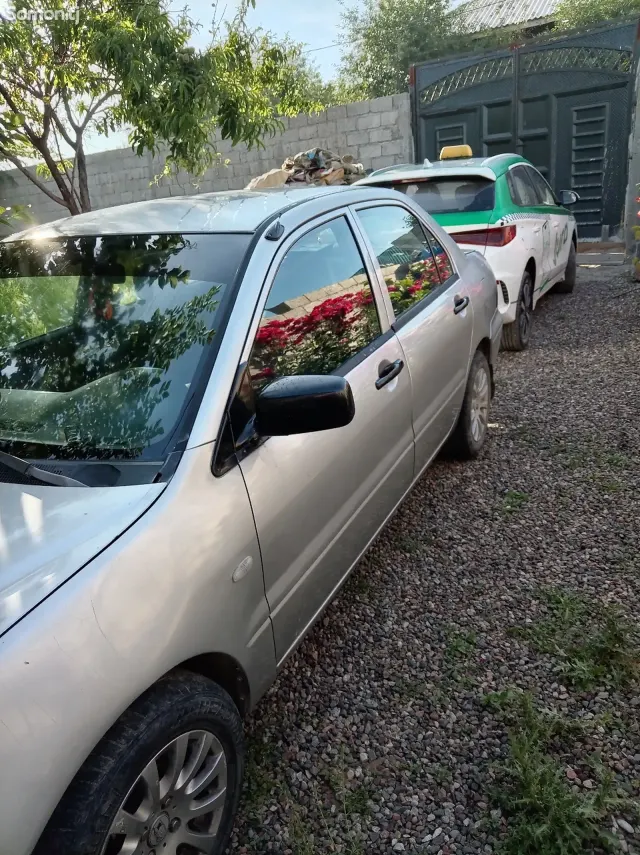 Mitsubishi Lancer 2003 · 1.5 AT