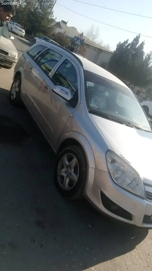 Opel Astra H 2008 · 1.8 MT