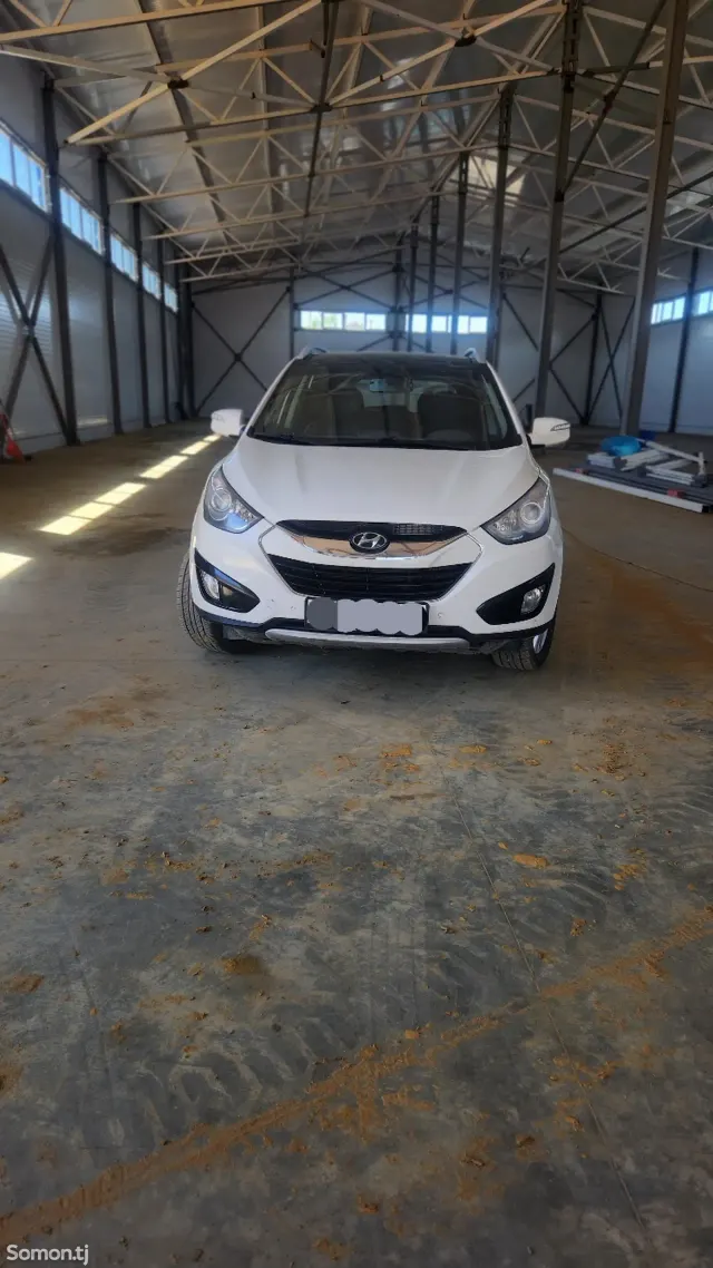 Hyundai Tucson 2012 · 2.0 AT