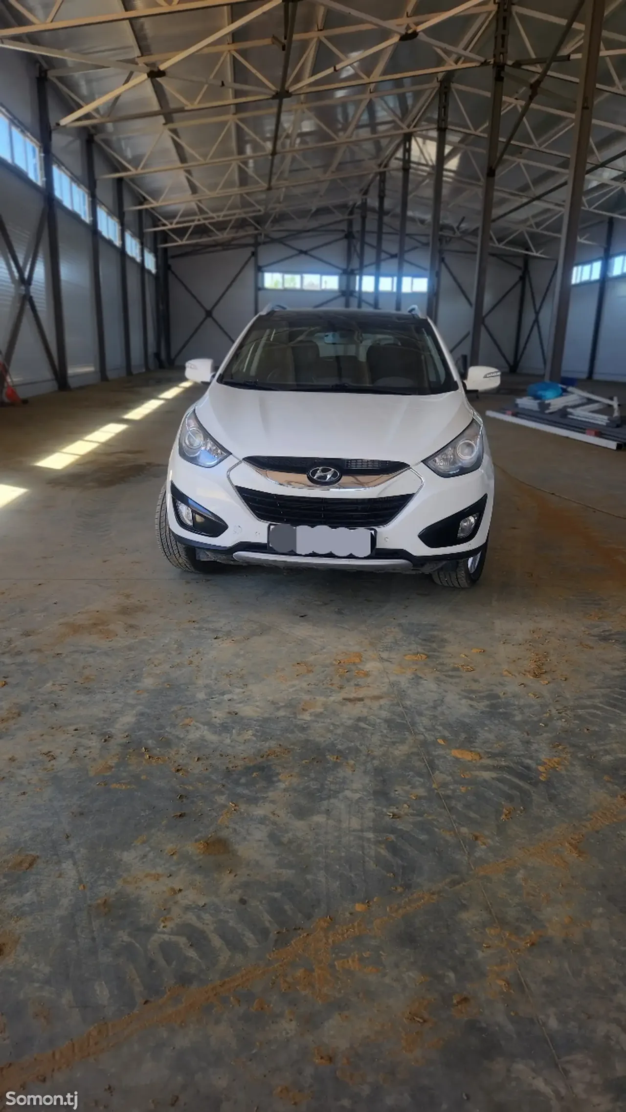 Hyundai Tucson 2012 · 2.0 AT