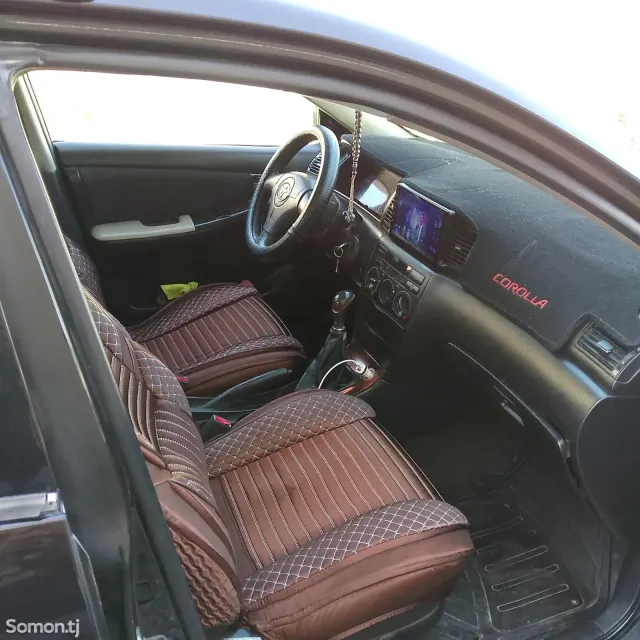 Toyota Corolla 2004 · 1.6 MT