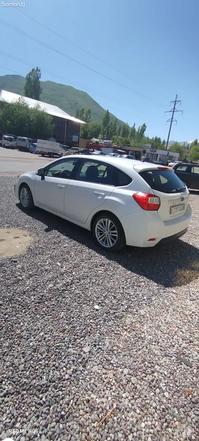 Subaru Impreza 2012 · 1.8 AT