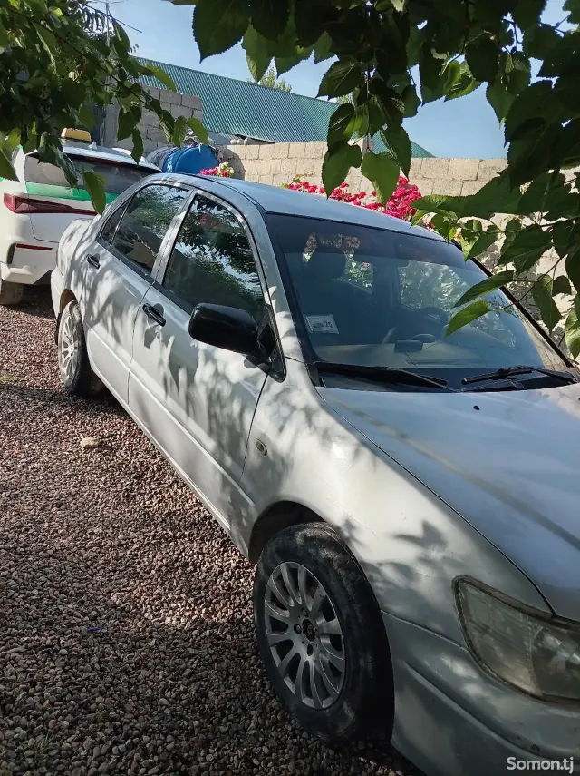 Mitsubishi Lancer 2003 · 1.5 AT