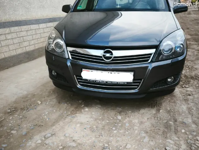 Opel Astra H 2009 · 1.8 MT