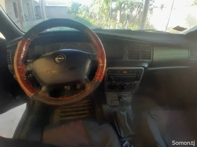 Opel Astra K 1998 · 1.8 MT