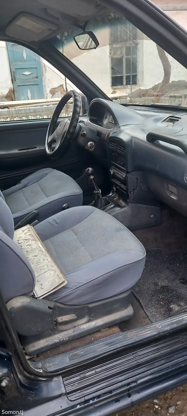 Kia Sportage 1996 · 3.5 MT