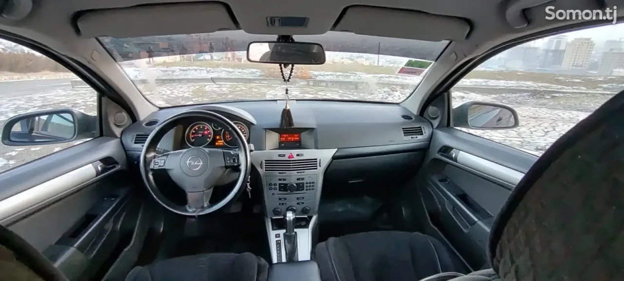 Opel Astra H 2009 · 1.8 AT
