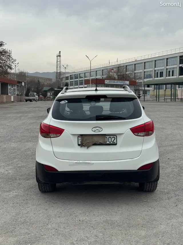 Hyundai Tucson 2012 · 2.0 AT