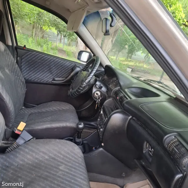 Opel Astra F 1998 · 1.6 MT