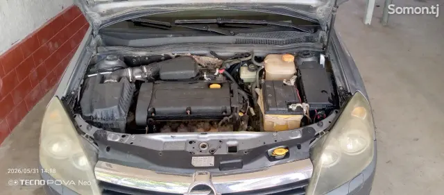 Opel Astra H 2006 · 1.6 MT