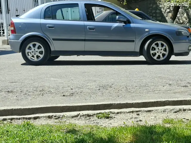Opel Astra G 2003 · 1.6 MT