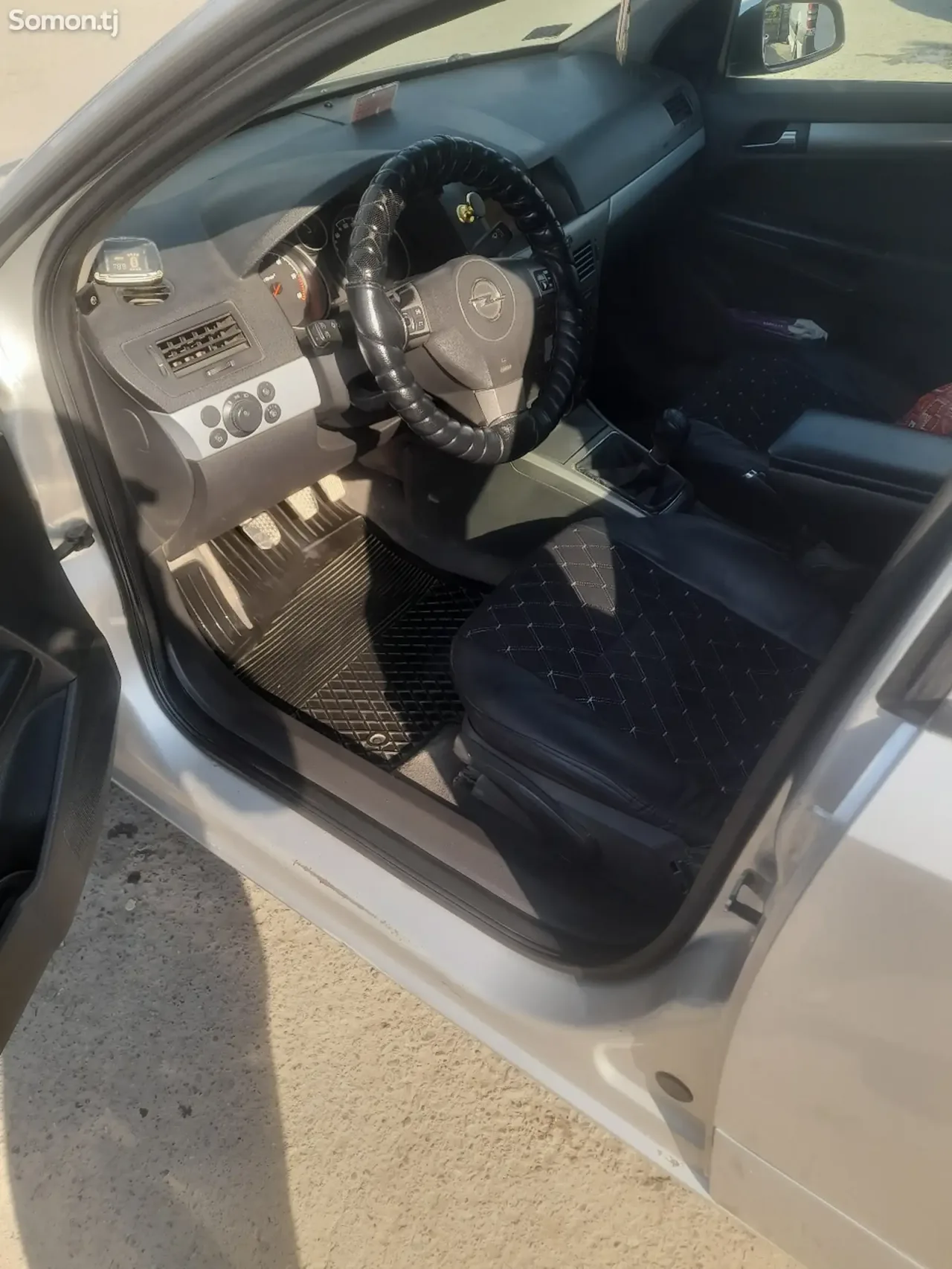 Opel Astra H 2006 · 1.8 MT