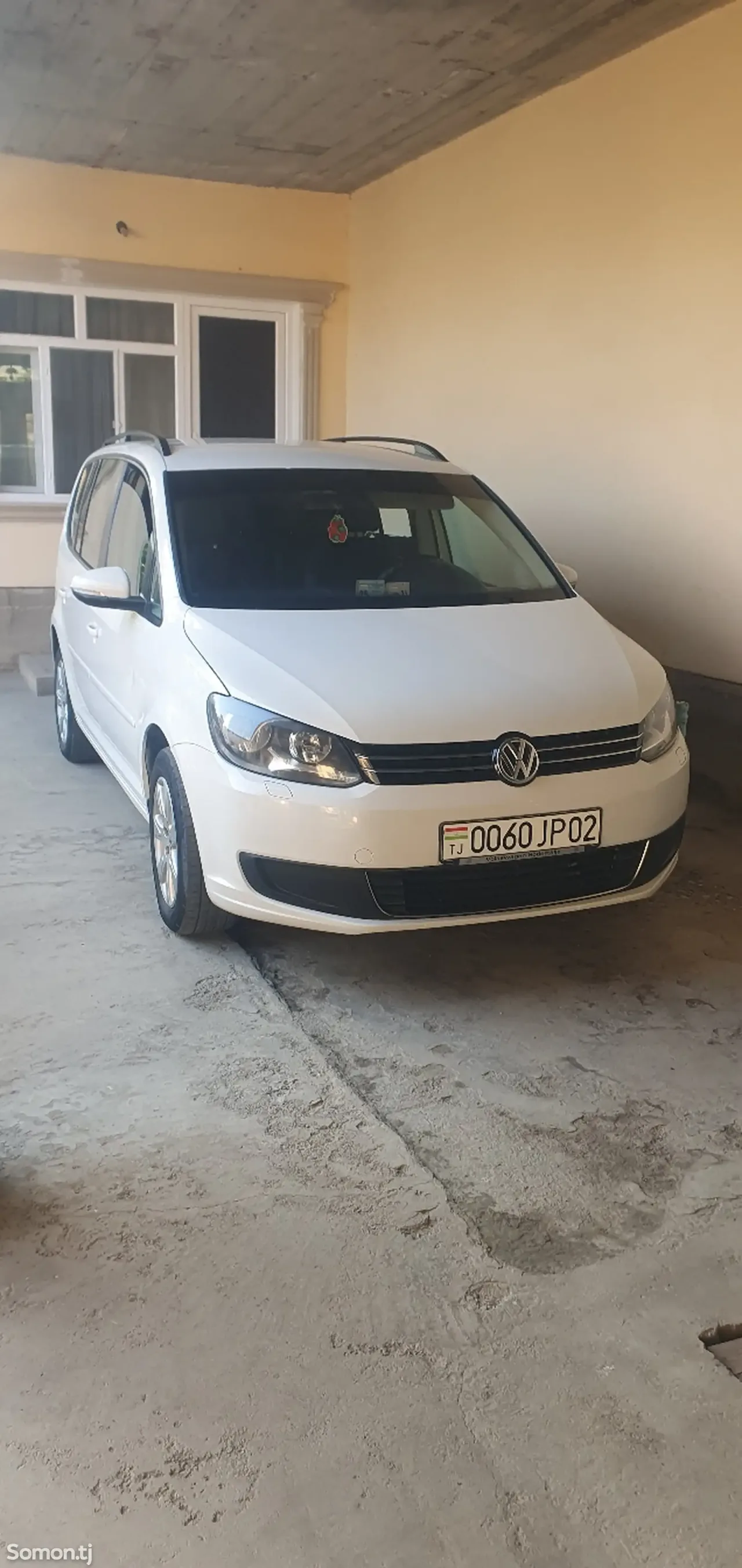 Volkswagen Touran 2011 · 1.4 MT