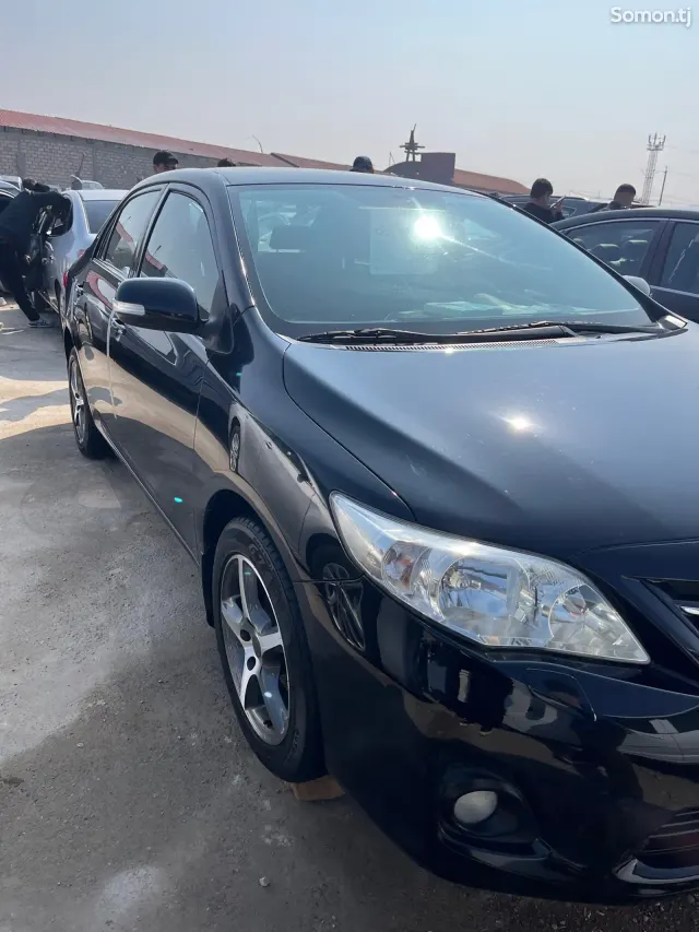 Toyota Corolla 2011 · 1.6 MT