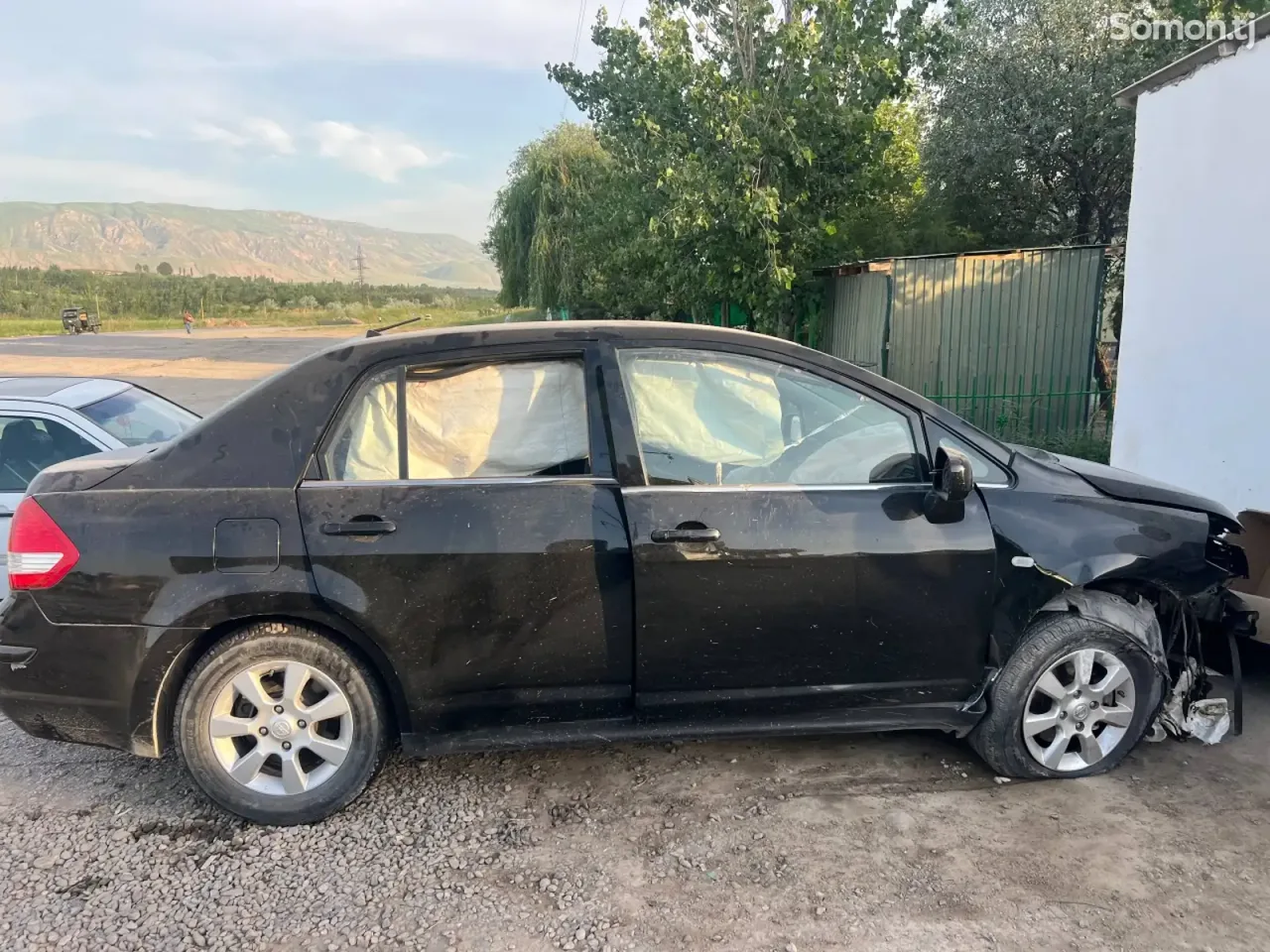 Nissan Tiida 2008 · MT