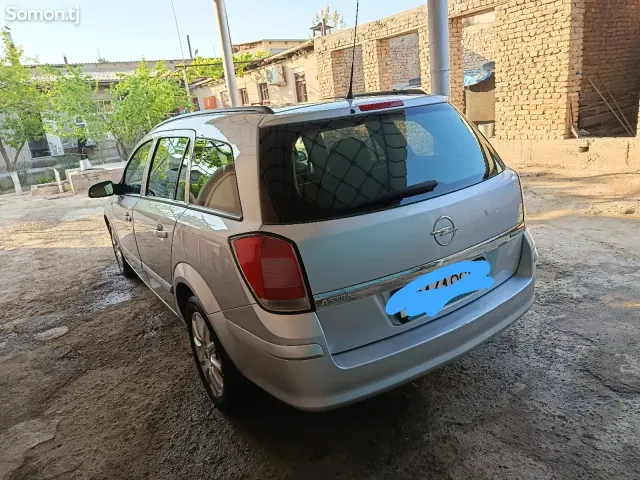 Opel Astra H 2006 · 1.6 MT