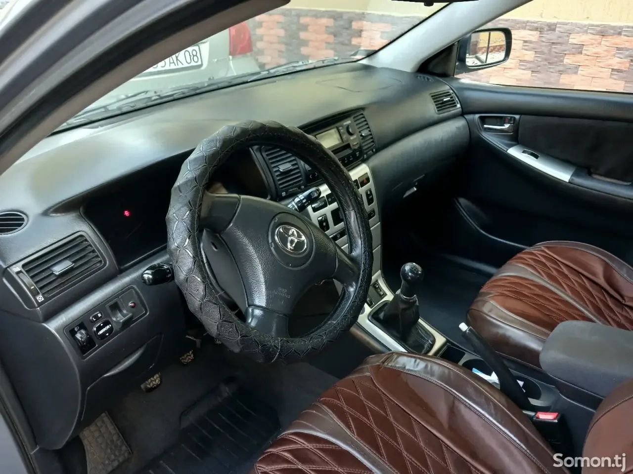 Toyota Corolla 2004 · 1.6 MT