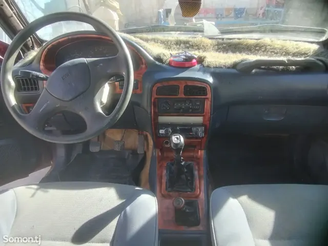 Kia Sportage 1995 · 1.8 MT