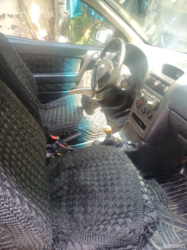 Opel Astra G 1998 · 1.6 MT