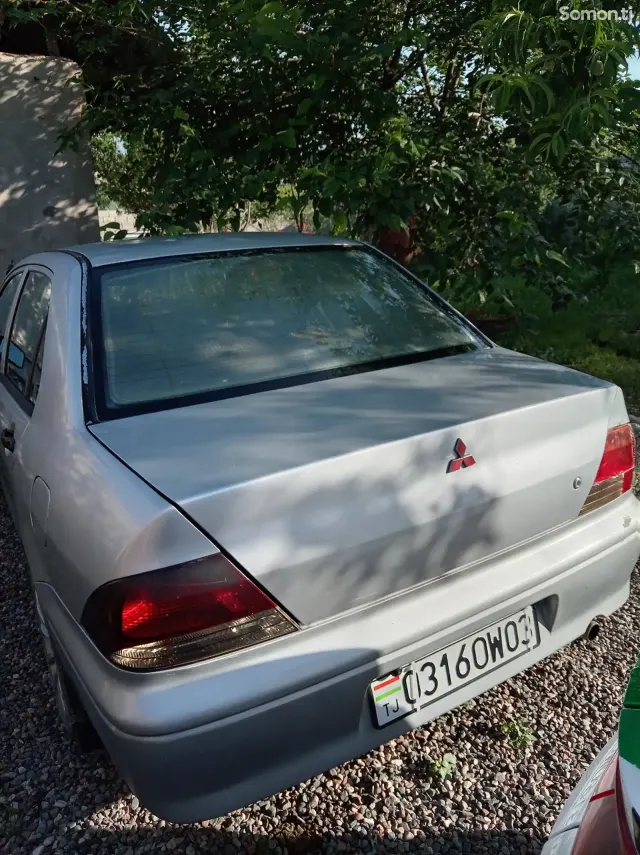 Mitsubishi Lancer 2003 · 1.5 AT