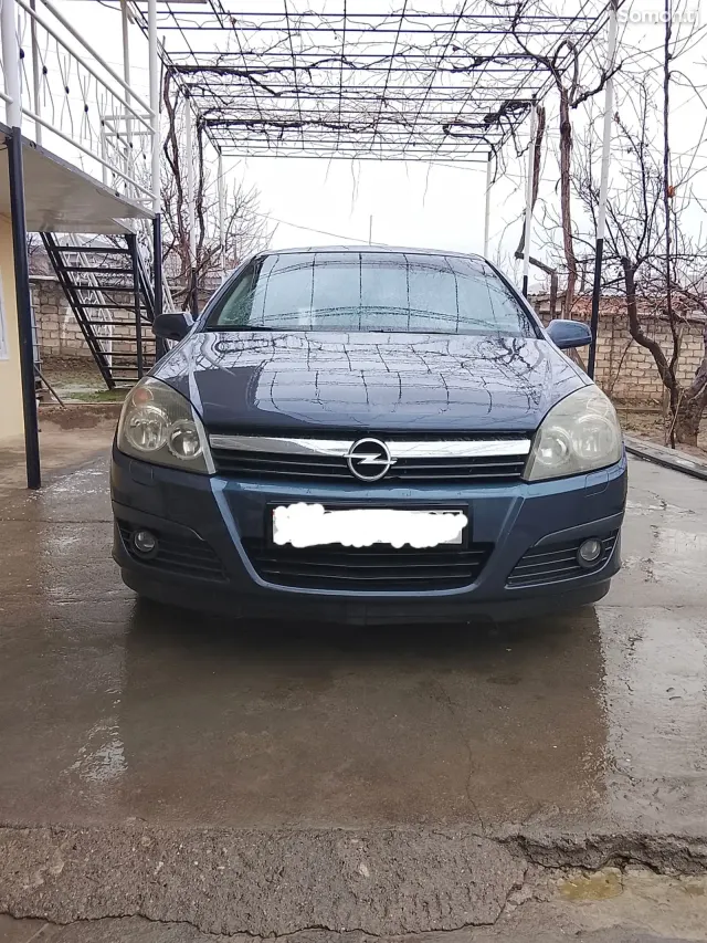 Opel Astra H 2006 · 1.6 MT