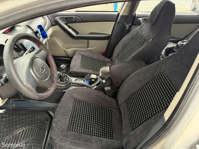 Kia Cerato 2009 · 1.6 MT