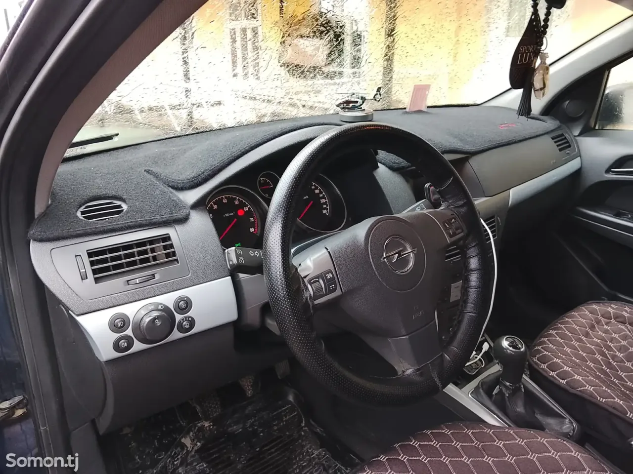 Opel Astra H 2006 · 1.6 MT