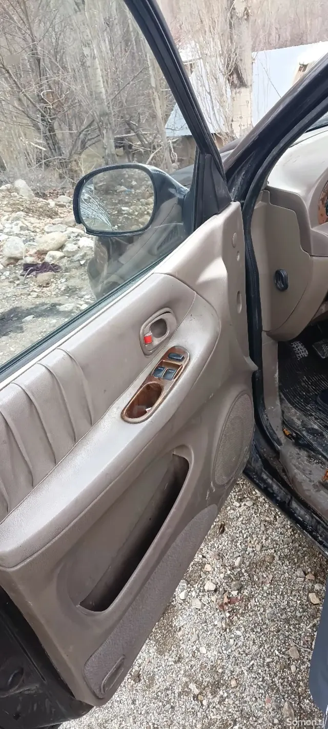 Kia Carnival 2004 · 2.9 MT