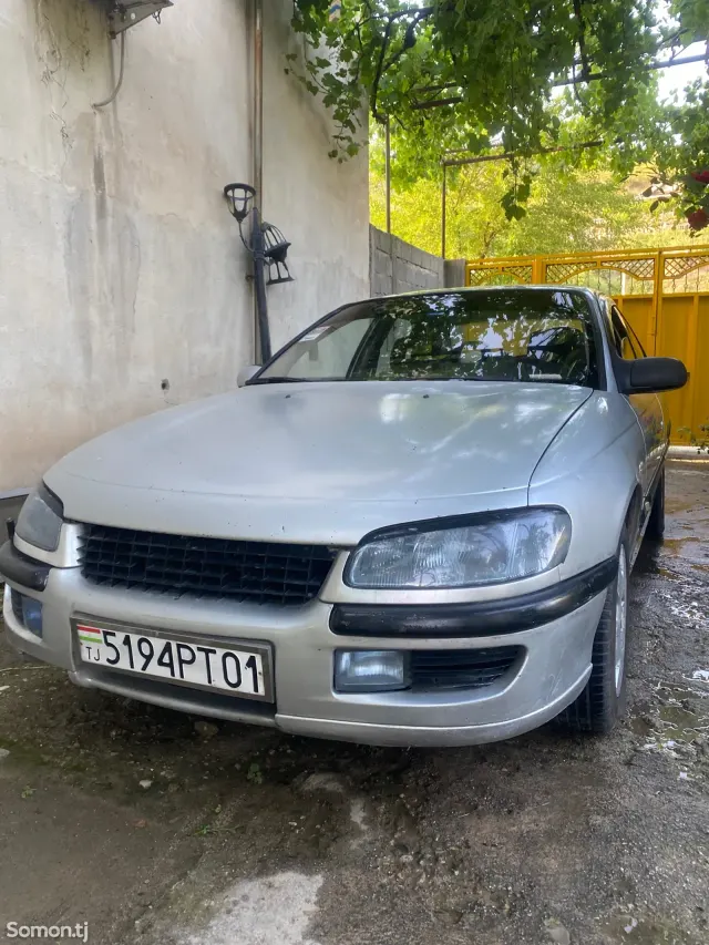 Opel Omega 1996 · 1.8 MT