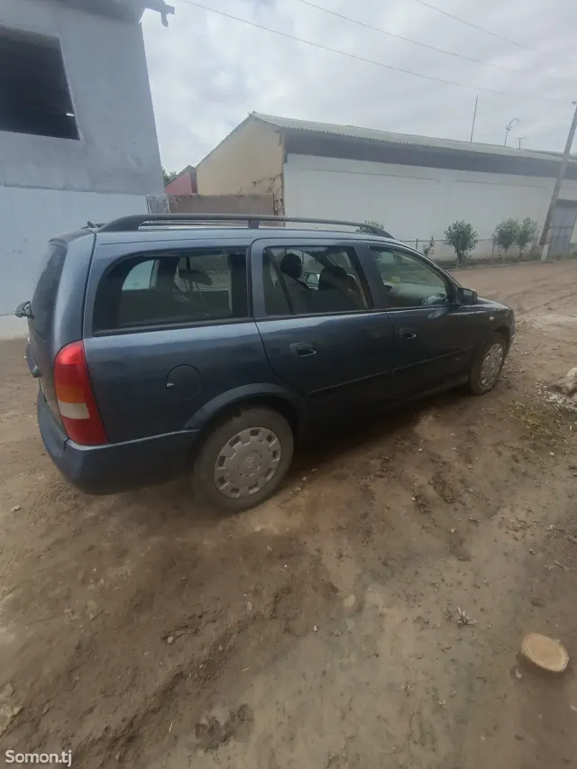Opel Astra G 1999 · 1.8 MT