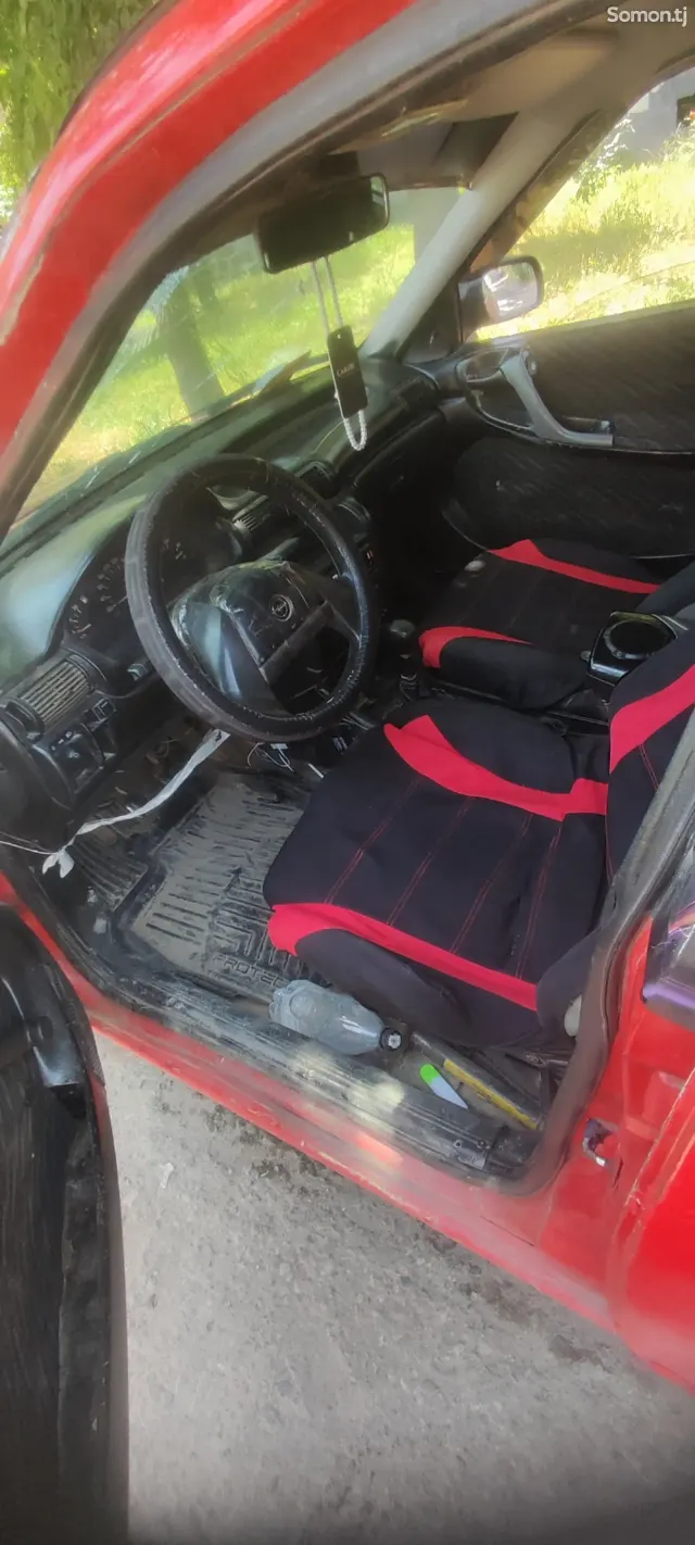 Opel Astra F 1994 · 1.6 MT