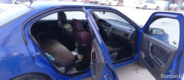 Nissan Primera 1998 · 1.6 MT