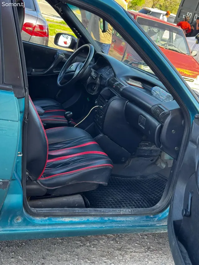 Opel Astra F 1995 · 1.6 MT