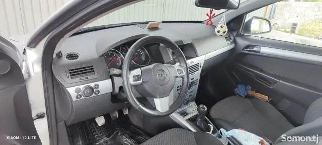 Opel Astra H 2010 · 1.8 MT