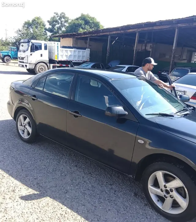 Mazda 6 2003 · 1.8 MT