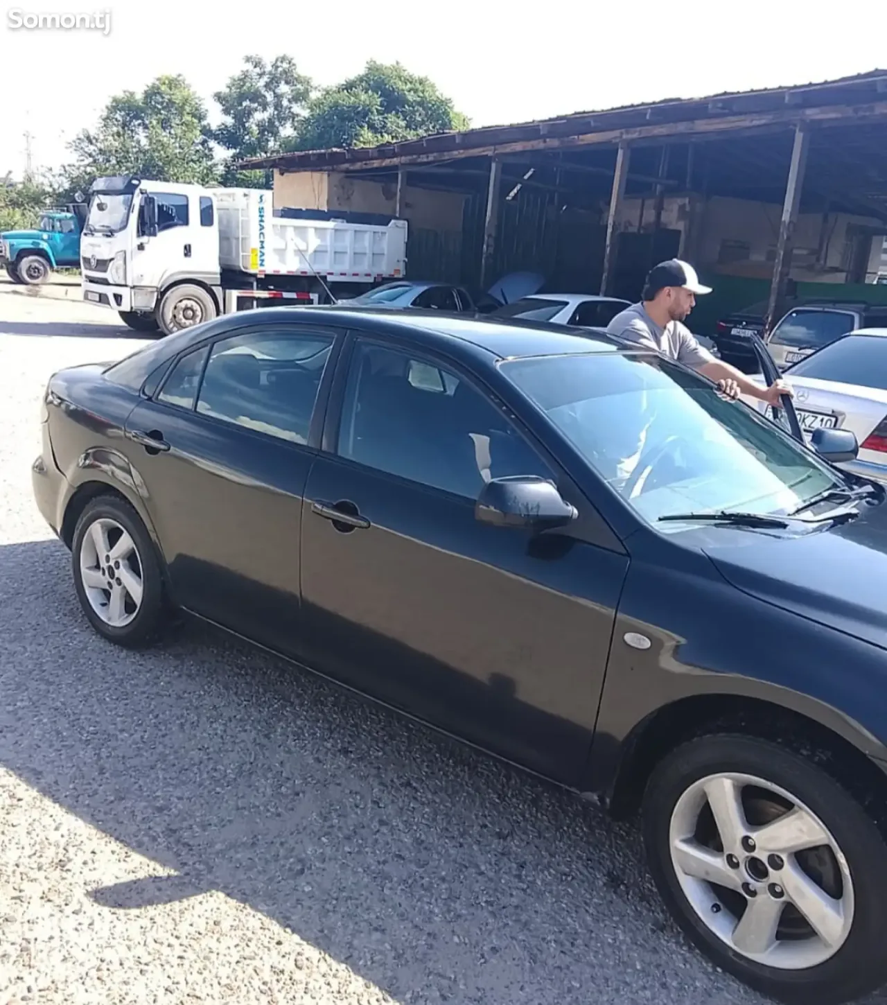 Mazda 6 2003 · 1.8 MT