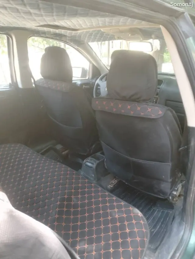 Opel Astra J 1998 · 1.6 MT