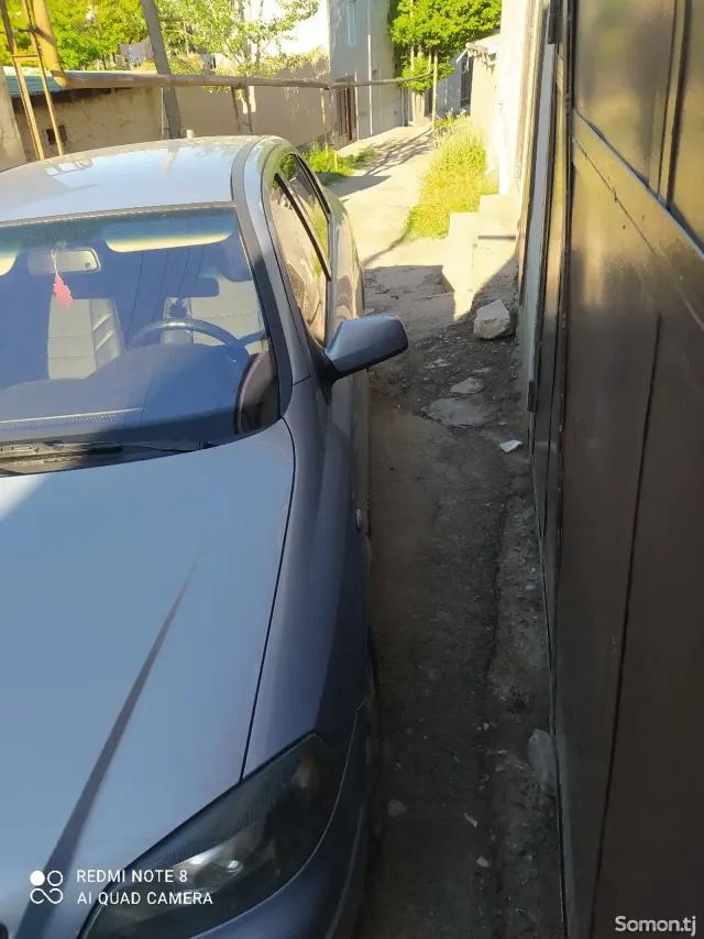 Opel Astra G 2003 · 1.6 MT