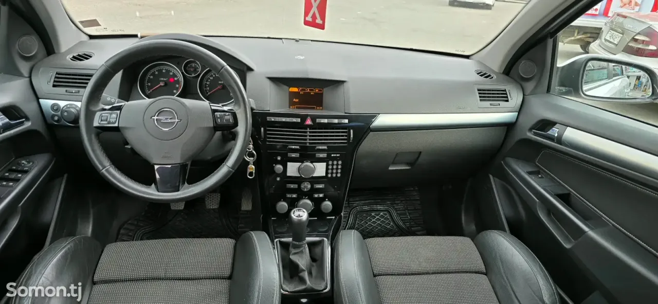 Opel Astra H 2009 · 1.8 MT