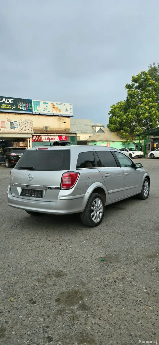 Opel Astra H 2009 · 1.8 MT