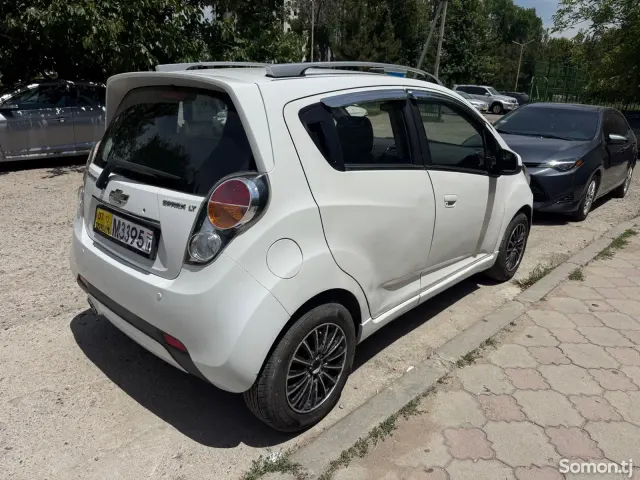 Chevrolet Spark 2012 · 1.1 AT