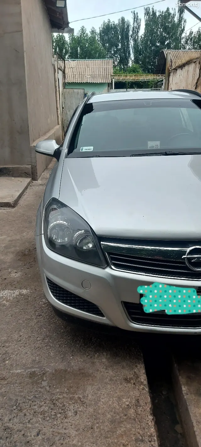 Opel Astra H 2011 · 1.6 MT