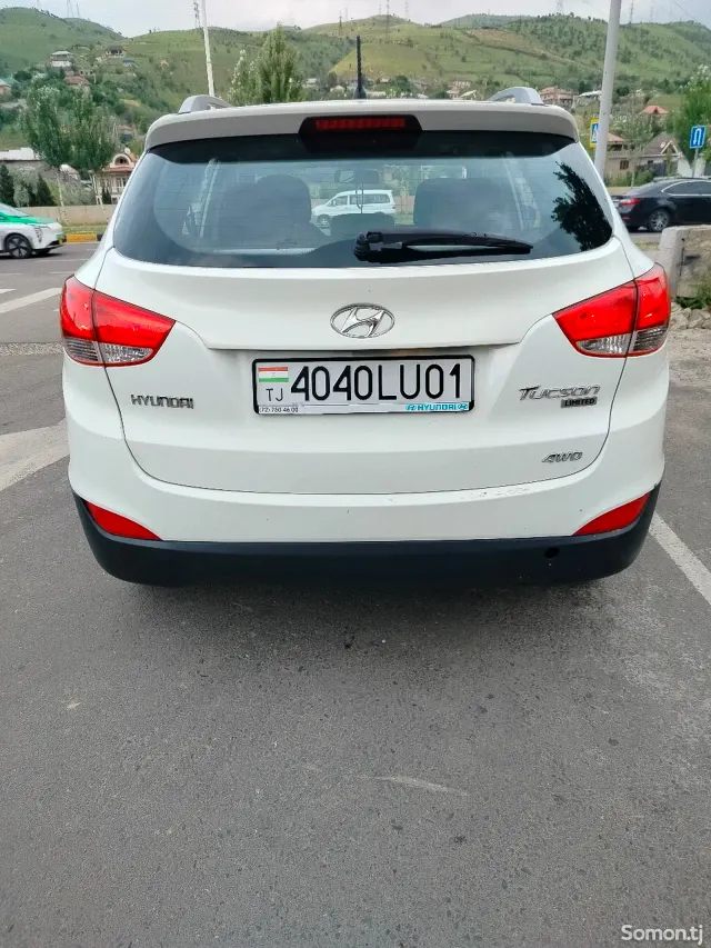 Hyundai Tucson 2011 · 2.4 AT