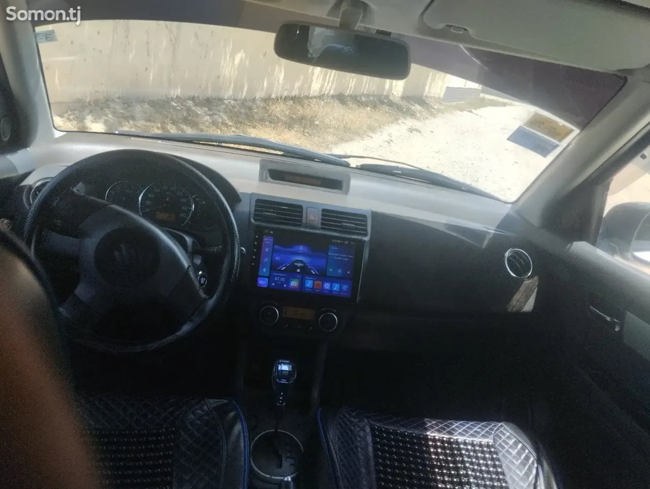 Suzuki Swift 2009 · 1.3 AT