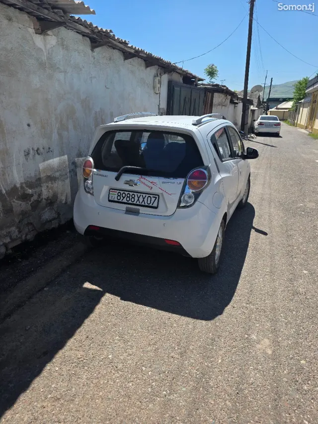 Chevrolet Spark 2012 · 1.1 AT